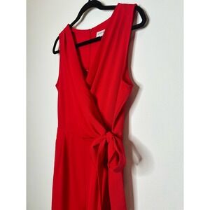 Red V-neck wrap jumpsuit with pockets